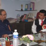 Hon. Dr. Manikrao Salunkhe In Discussion With Principal Praveen Chougale.