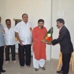 Prin. Praveen Chougale Welcomes Hon. Dr. Achyut Godbole